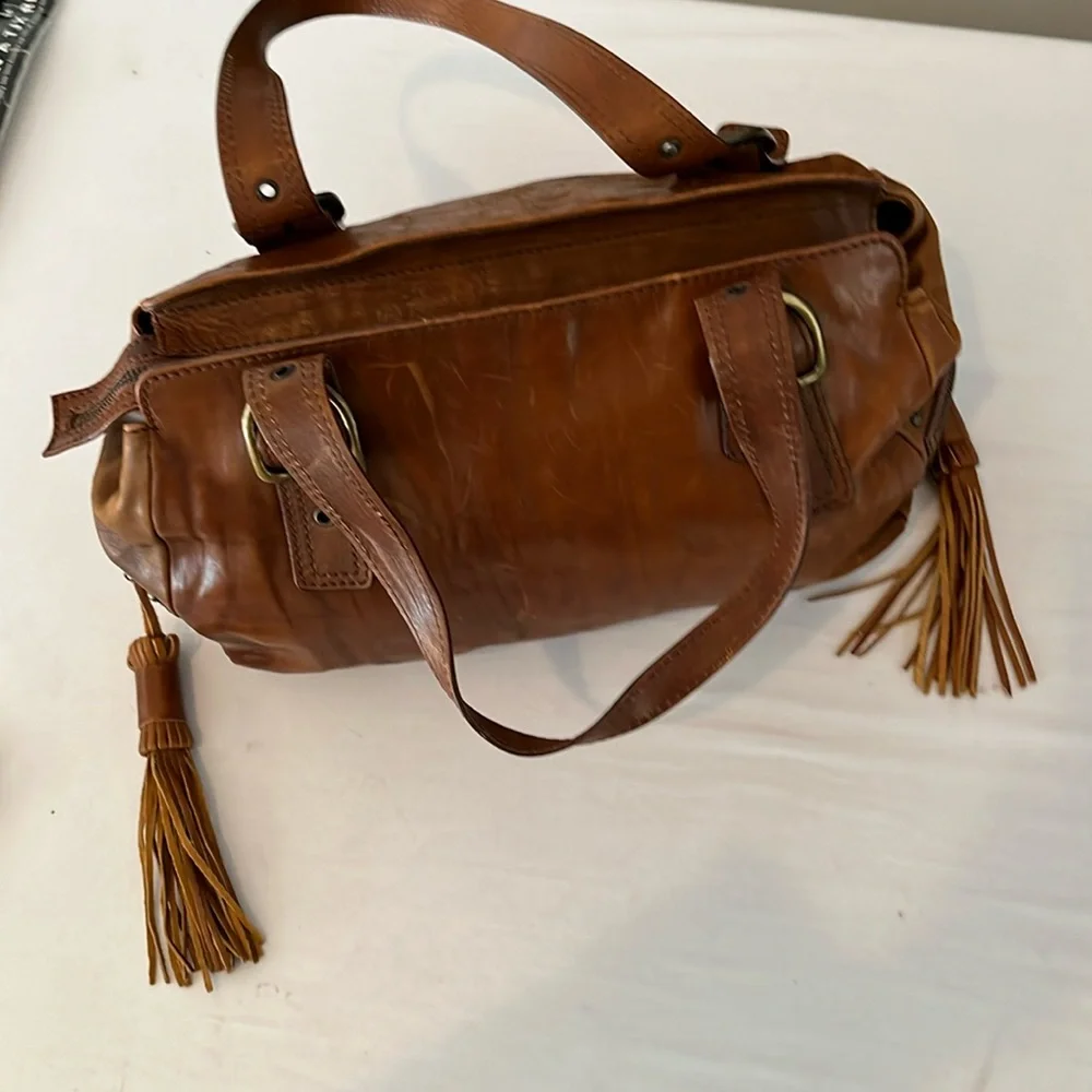 Capacciou large brown Leather bag  side zip pockets 2  long leather tassels